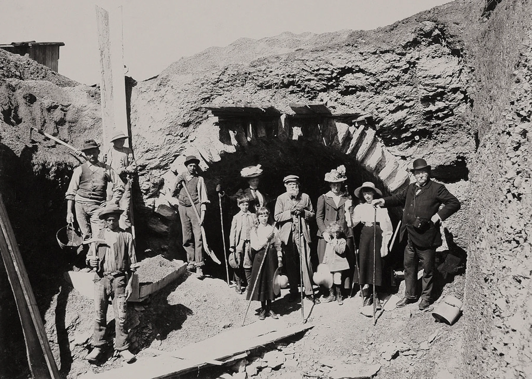 Workers at a railway excavation portal