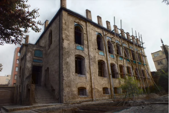 Parvin Etesami Hall during heritage restoration with façade scaffolding